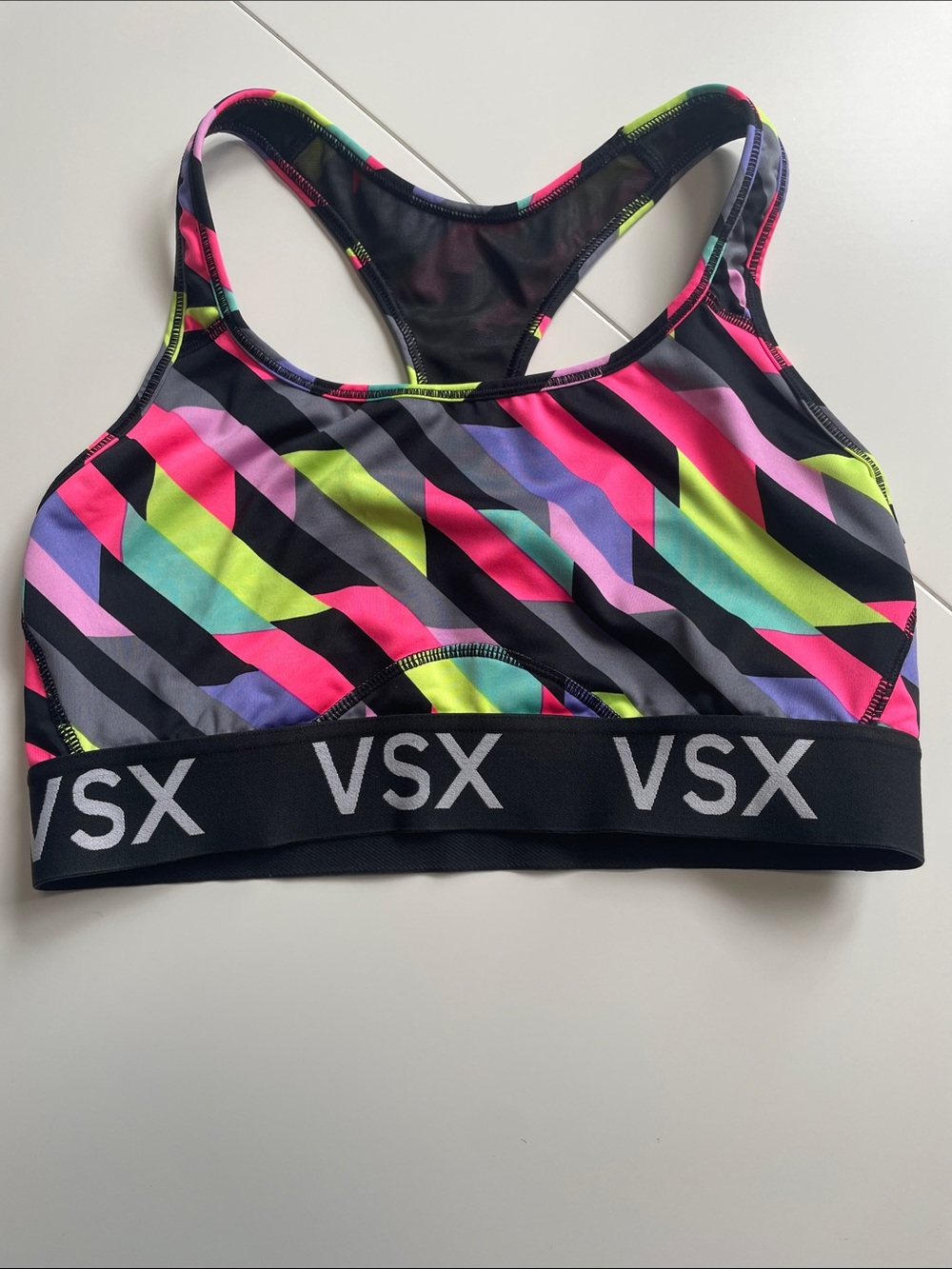 VSX Neon Stripe Racerback Sports Bra in Black, Pink, Lime & Purple